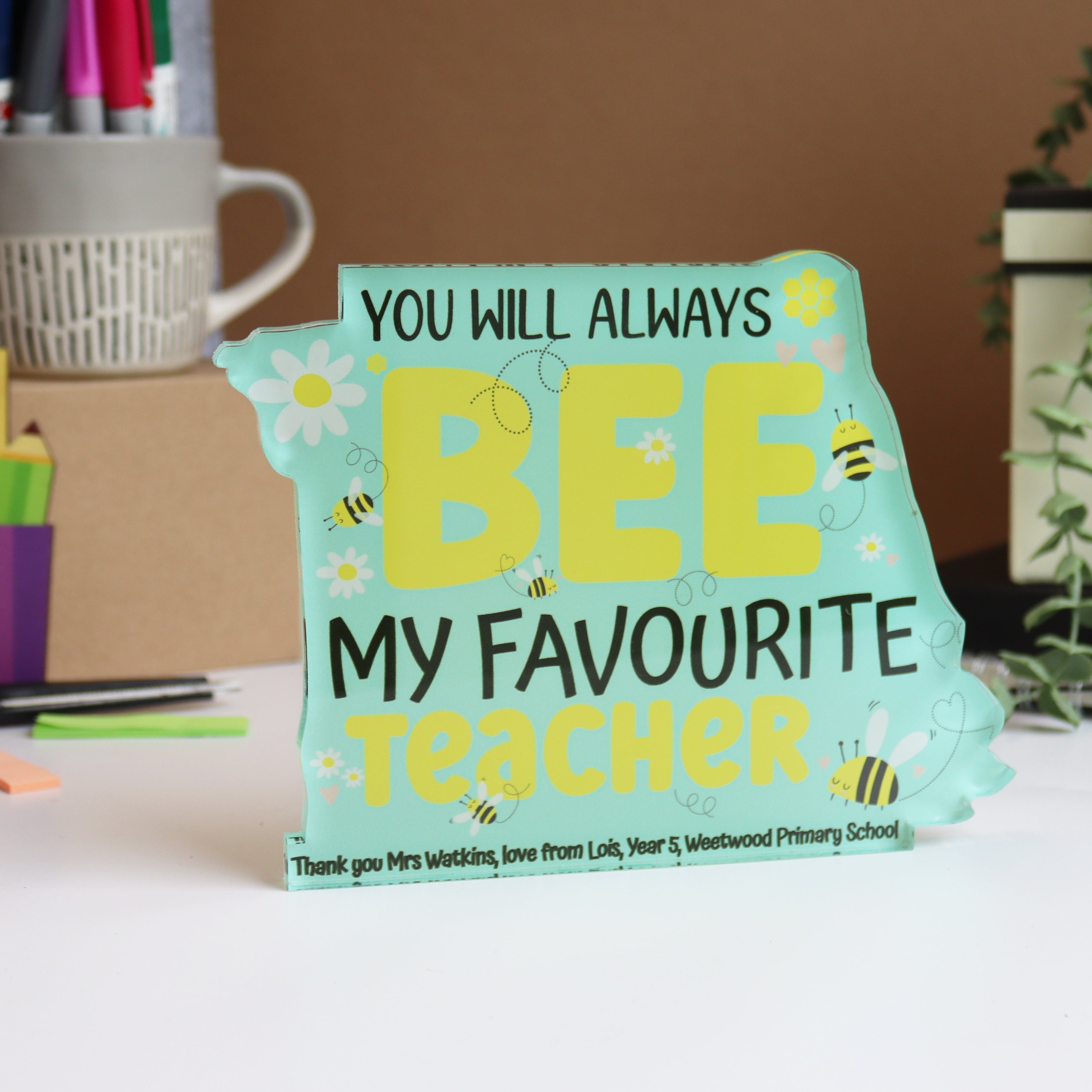 Fun and meaningful teacher gift, personalised desk stand with bee and flower motif.