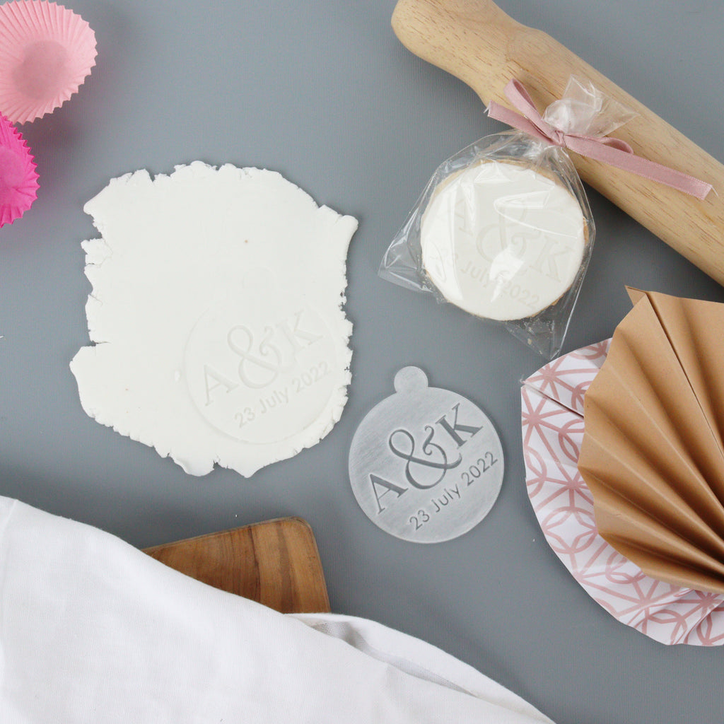 Acrylic wedding cookie press with monogram design
