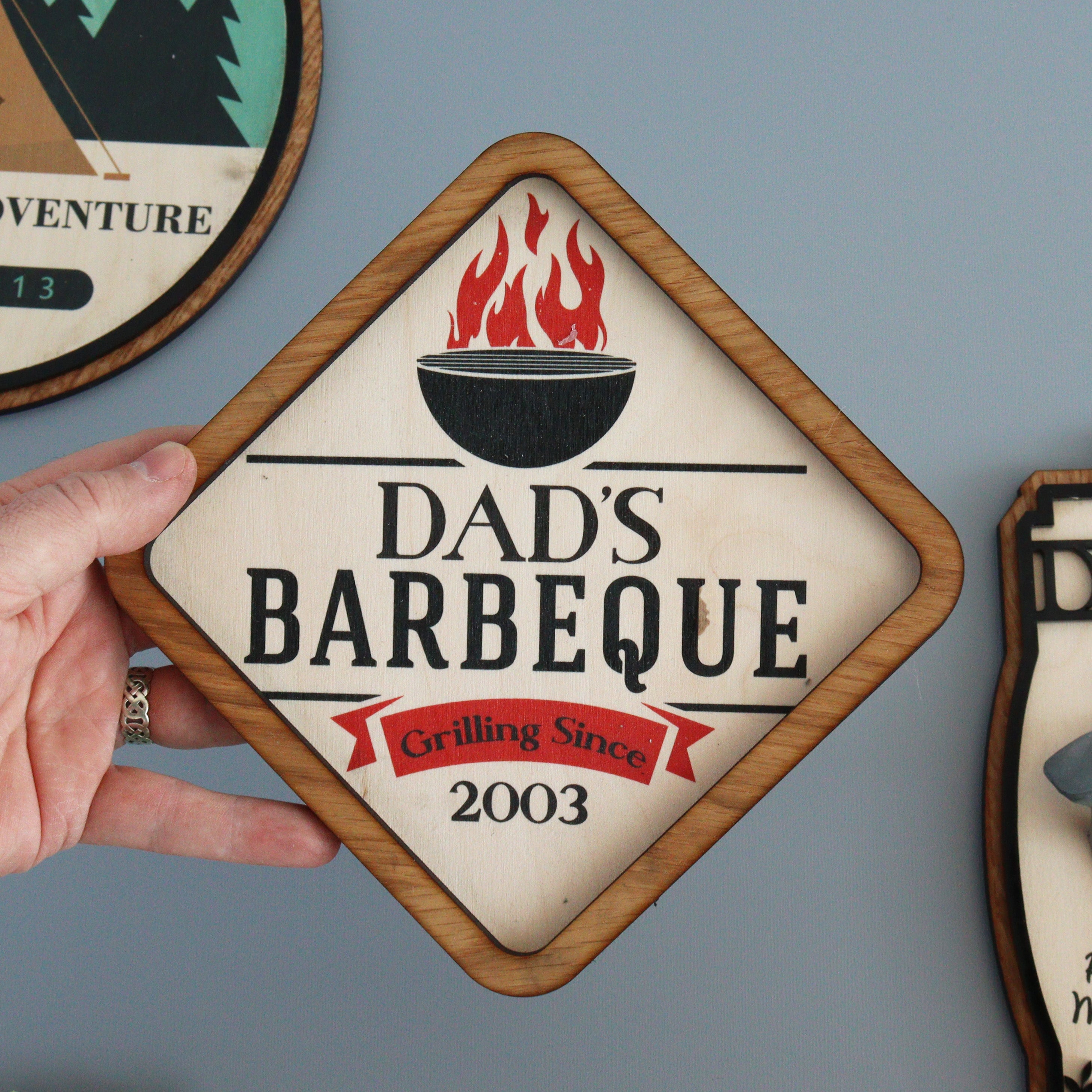 Custom wooden BBQ sign with Dad’s Barbecue text
