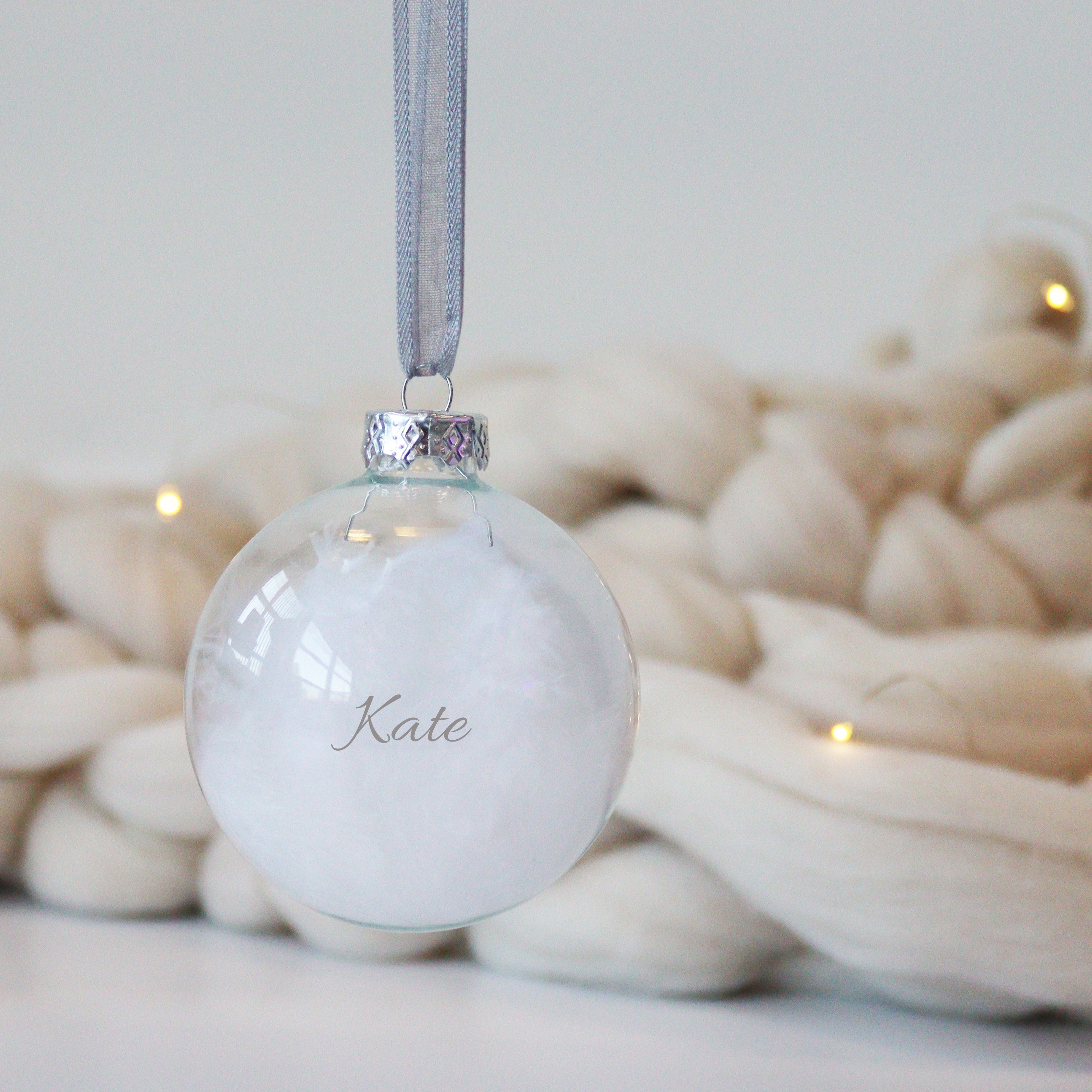 Glass memory feather ornament personalised with loved one’s name