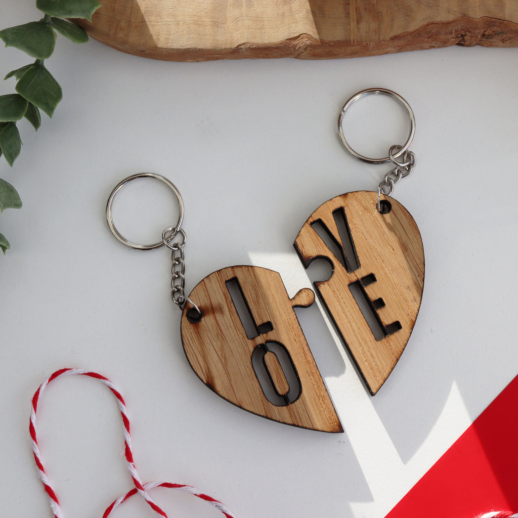 LOVE wooden valentines keyring set that has LO on one side of the split heart and VE on the other