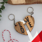 LOVE wooden valentines keyring set that has LO on one side of the split heart and VE on the other