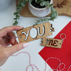 You and me valentines keyring set wooden keyring couples set close up