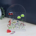 acrylic wildflower printed earrings shown from a different angle with personalisation as mum's earrings