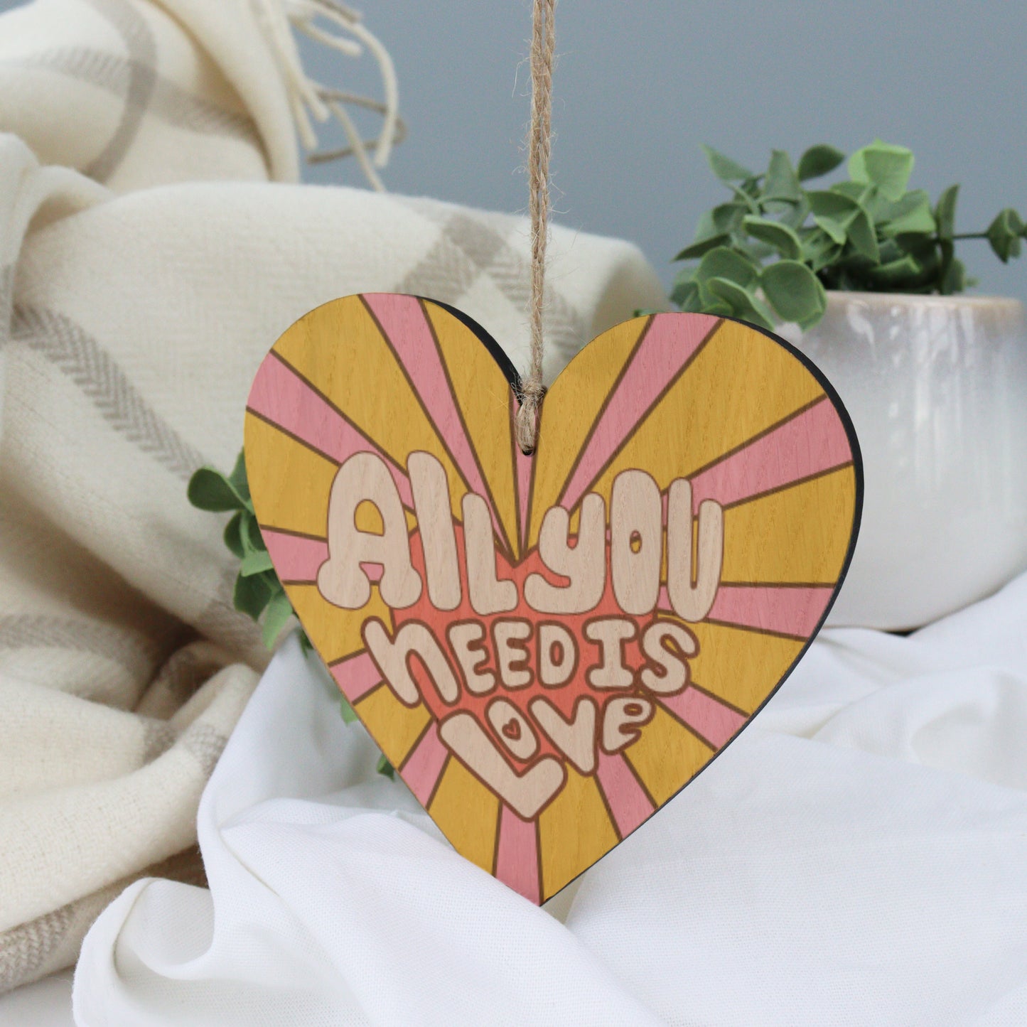 all you need is love retro typography design valentines hanging heart