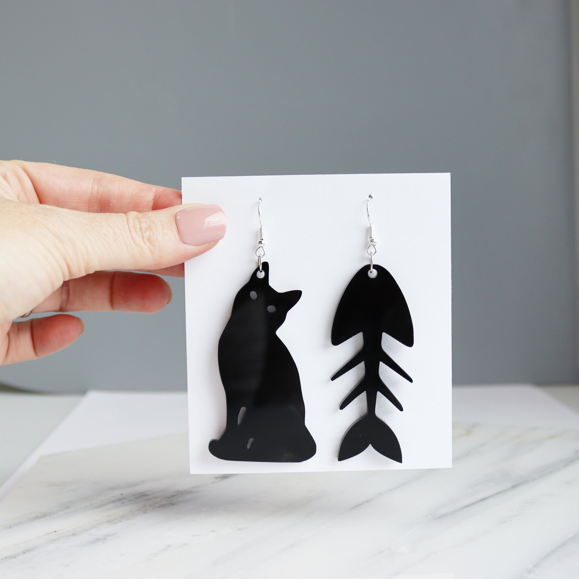 black cat and fish bone mismatches earrings cut from black acrylic perfect for Halloween party