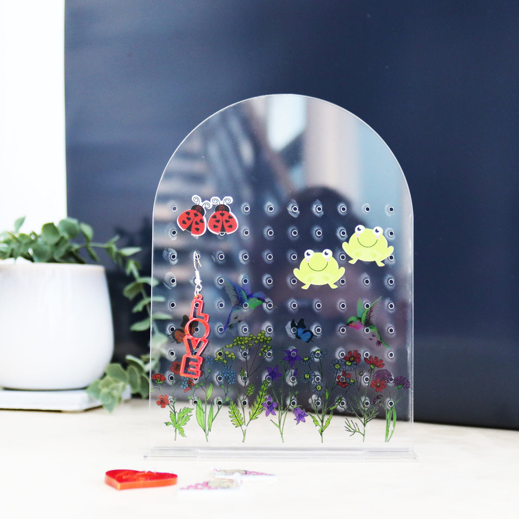 acrylic wildflower printed earrings shown from a different angle with personalisation as mum's earrings