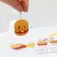 close up of burger earrings for burger and fries earrings hand held burger