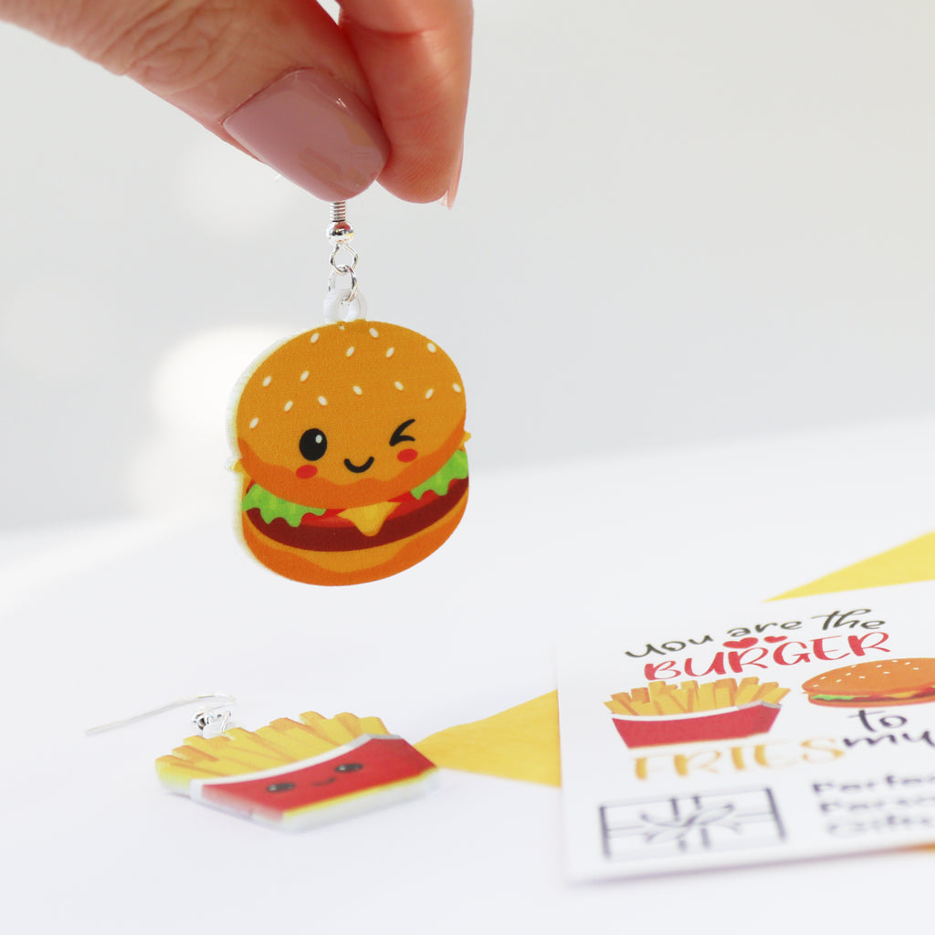 close up of burger earrings for burger and fries earrings hand held burger