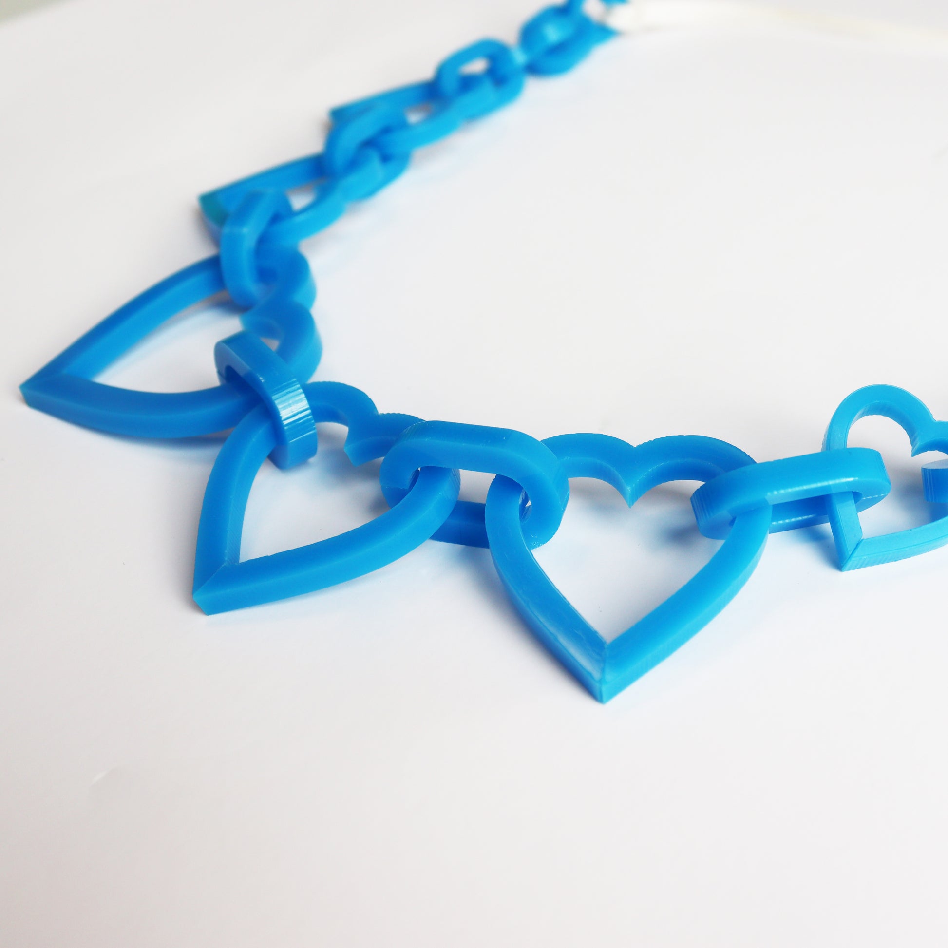 close up of heart acrylic statement necklace