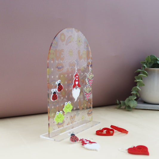 funky love pattern acrylic earring holder printed with funky 60s style pattern love design