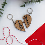 heart keyring split into with LOVE written between the two couples keyring set