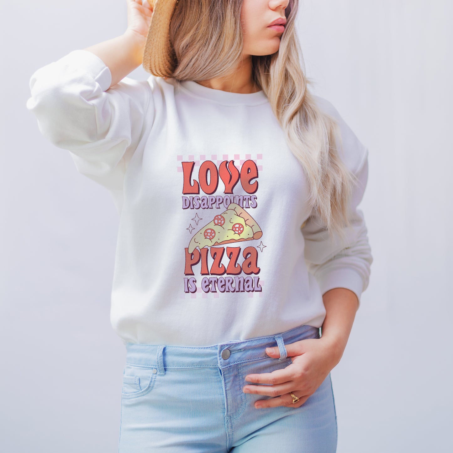 Retro Love disappoints pizza is eternal white jumper styled with jeans