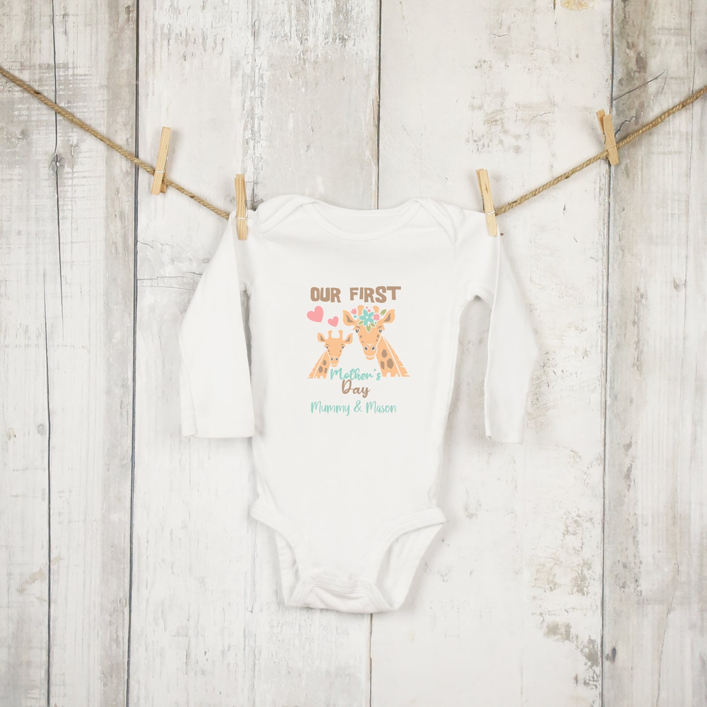 personalised first mothers day baby grow with giraffe design