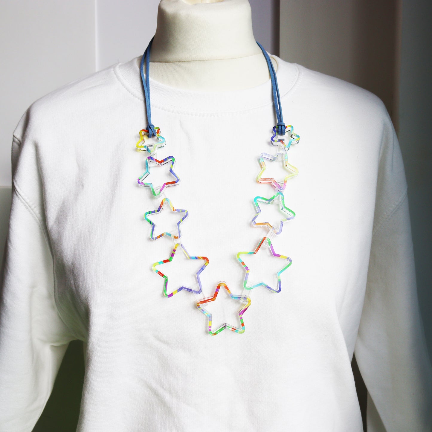 printed star acrylic clear necklace statement fashion jewellery shown on model