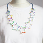 statement large printed acrylic star necklace cut from acrylic close up