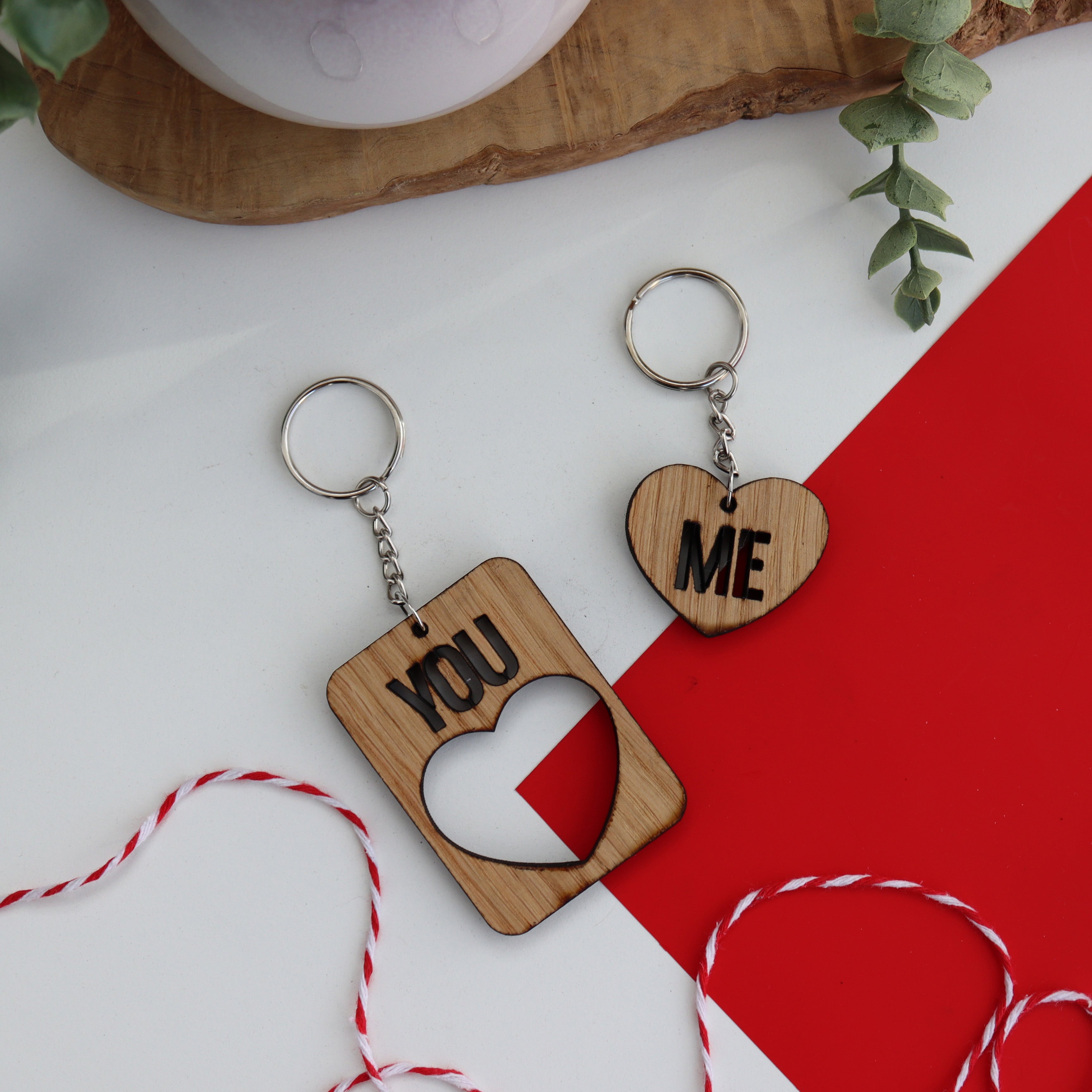 wooden keyring set large keyring has you cut out of it and the small heart keyring has Me cut out of it