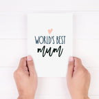worlds best mum card shown being held in a woman's hands