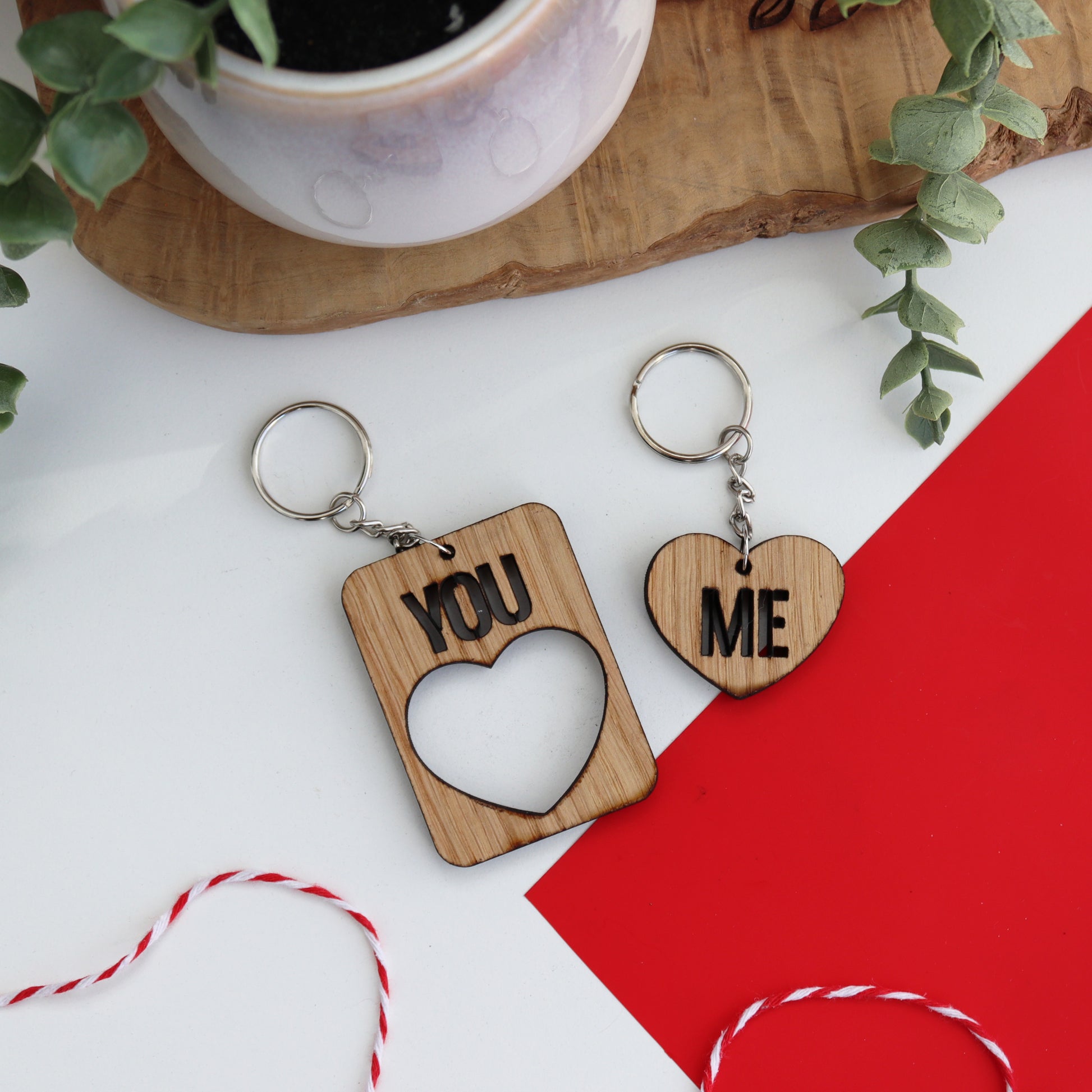 wooden keyring set large keyring has you cut out of it and the small heart keyring has Me cut out of it